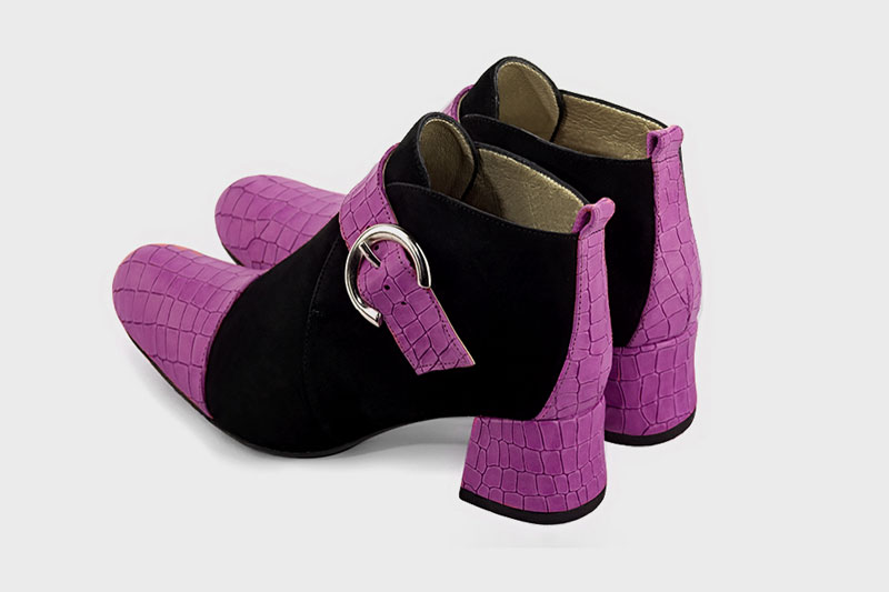 Mauve purple and matt black women's ankle boots with buckles at the front. Round toe. Low flare heels. Rear view - Florence KOOIJMAN